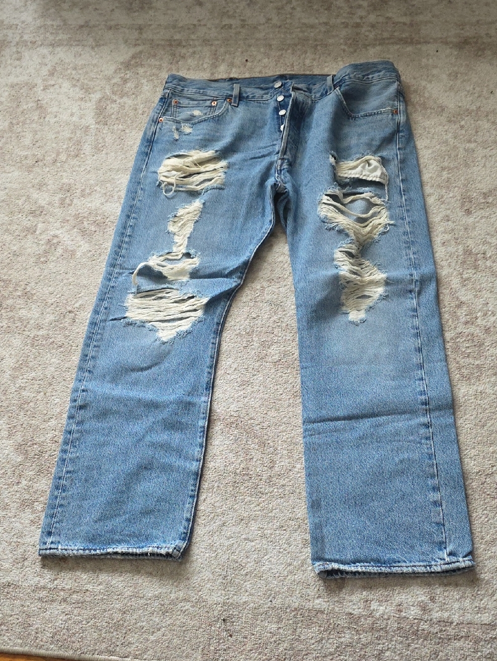 Levi's light blue denim jeans with contrast gold stitching